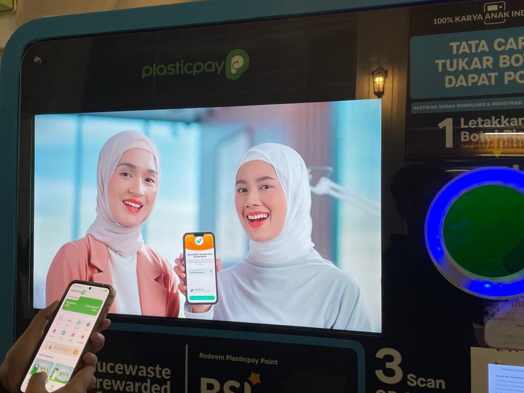 Tampilan aplikasi Plasticpay yang menunjukkan poin hasil penukaran botol plastik
